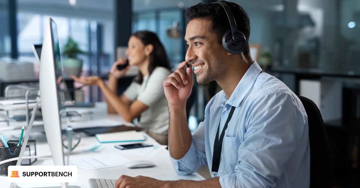 Three team members with headsets in an office, showcasing the importance of emotional intelligence in enhancing customer service